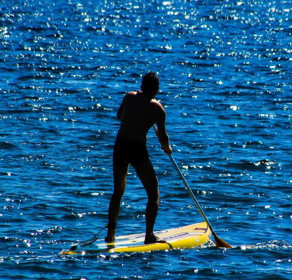 Person paddle boarding
